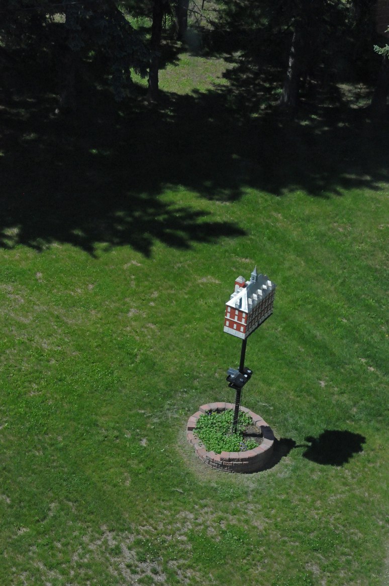 Looking down at the same birdhouse from top floor window.
