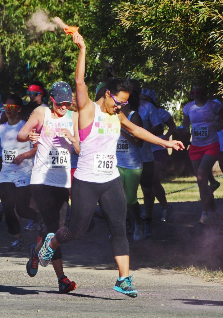 Adding her own color to the group around.