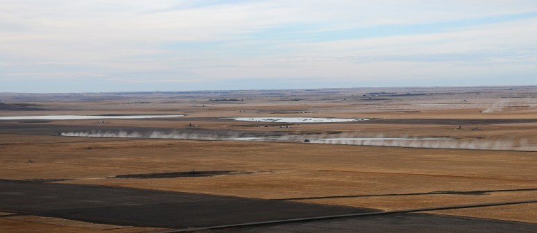 Trucks carrying their load to the granary